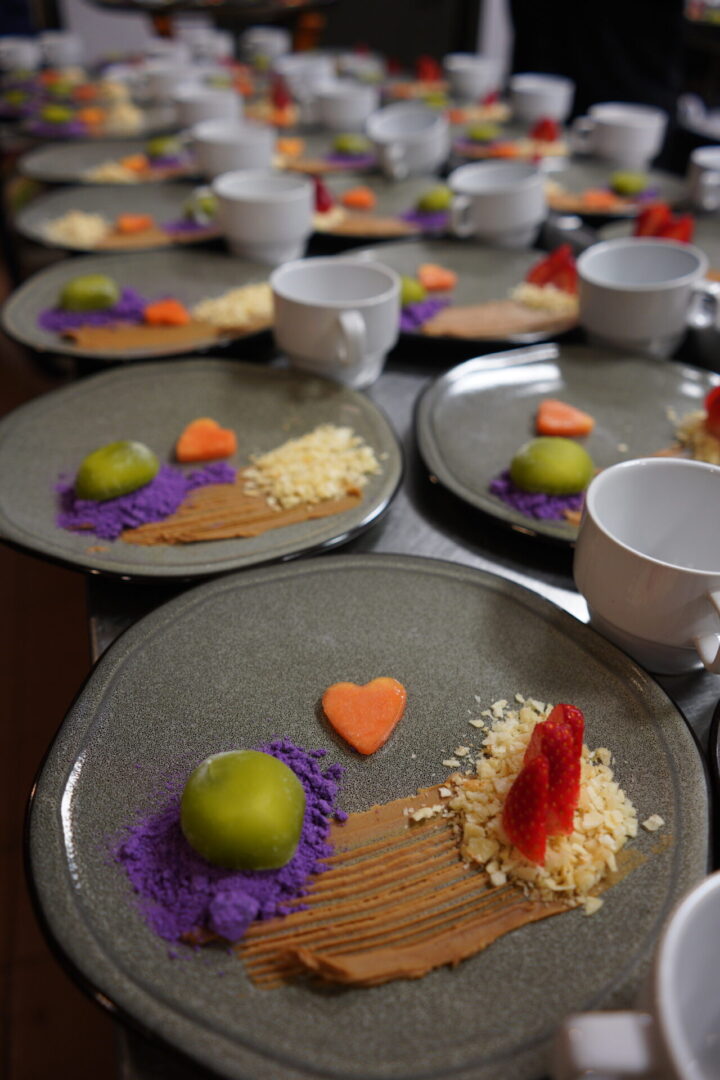 A table with plates of food on it